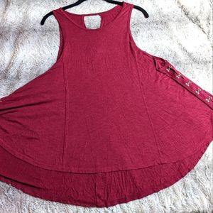 Tank top with metal detailing.